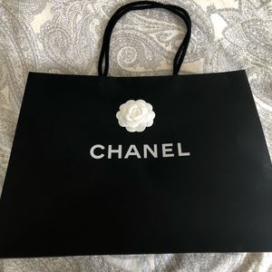 Chanel carrier bag with flower